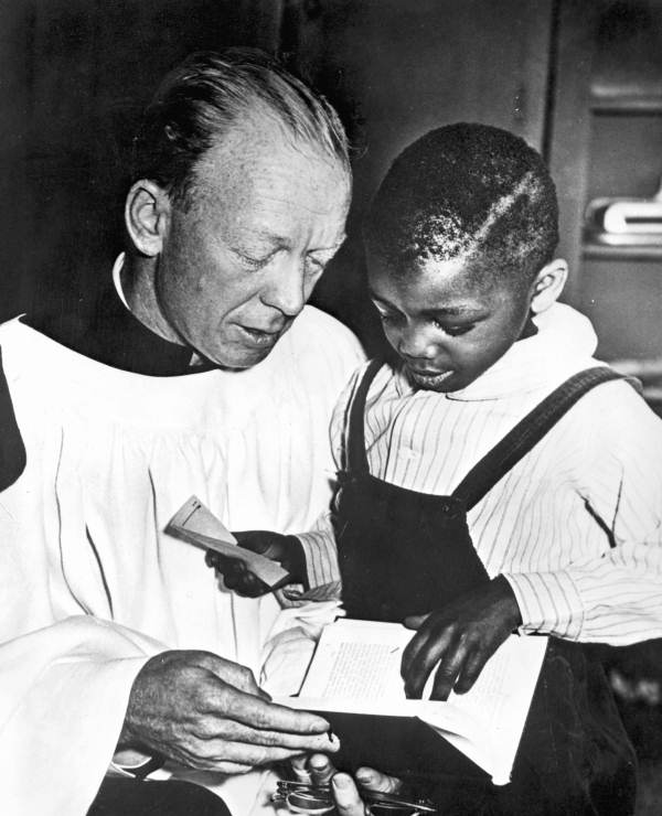 Red Barber with a child at Sunday school in Tallahassee, Florida.