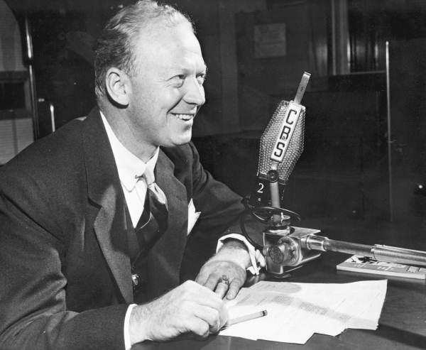 Red Barber uses a CBS microphone