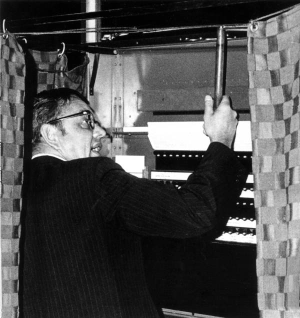 G. Harrold Carswell using voting machine.