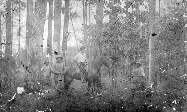 Turpentine owner with workers - Jackson County, Florida