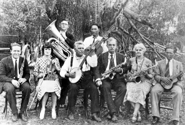 Kelly family members posing with local townspeople.