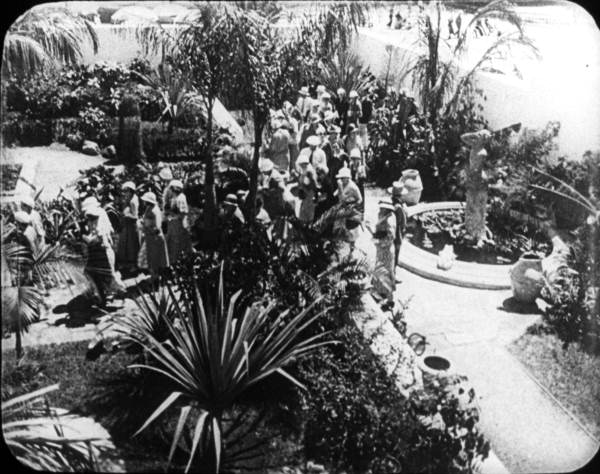 People admiring a walk through the Florida pavilion at World's Fair in New York
