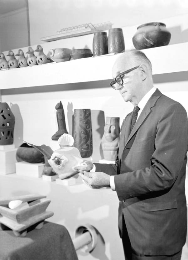 Ivan Gundrum admiring his recreated Weedon Island pottery - Tallahassee, Florida.