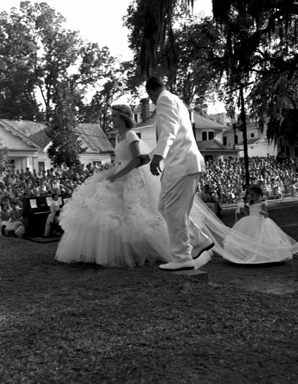 May Day king and queen approach the may oak in Lewis Park - Tallahassee, Florida.