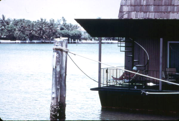 A houseboat parked in the Intracoastal Waterway - Miami Beach, Florida