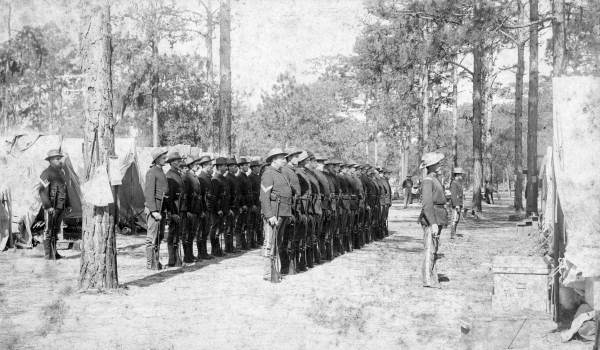 Spanish-American War soldiers standing in formation.