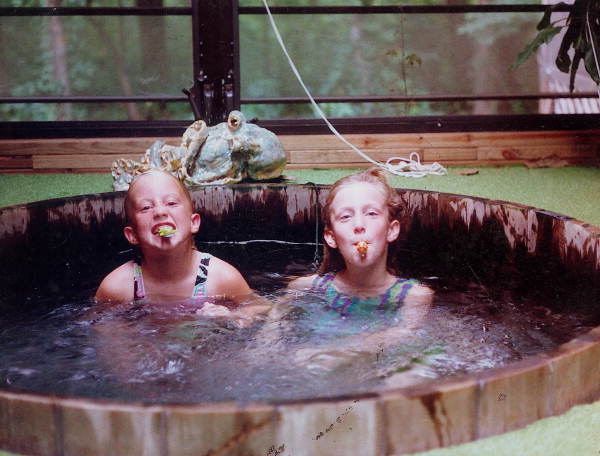Alaina Bloyd and friend in hot tub at the Miccosukee Land Co-op.