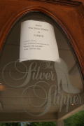 Sign taped to the front door of the Silver Slipper restaurant in Tallahassee, Florida.