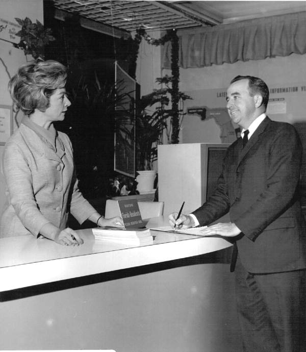 June Murphy speaking with a Florida resident visiting the Florida Showcase at Rockefeller Center in New York.