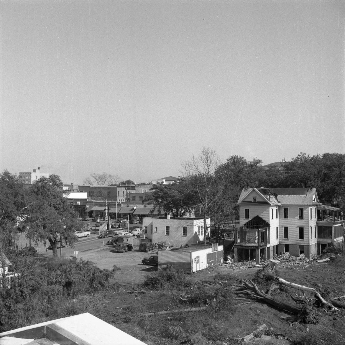 Two views of the demolition of homes surrounding the Capitol