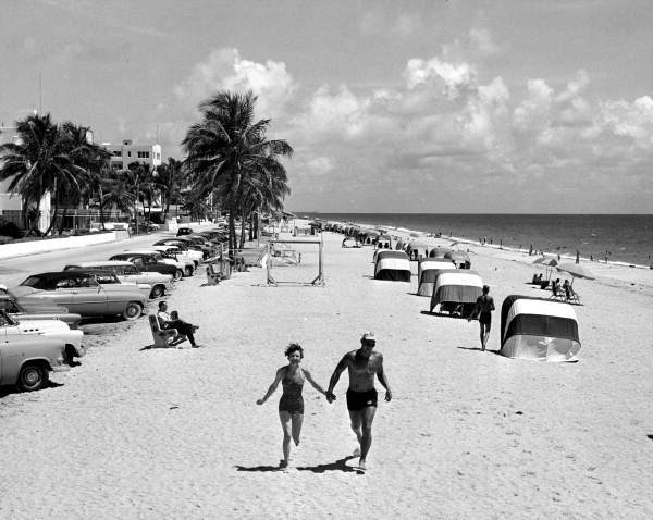 A couple jogging on the beach - Fort Lauderdale, Florida.