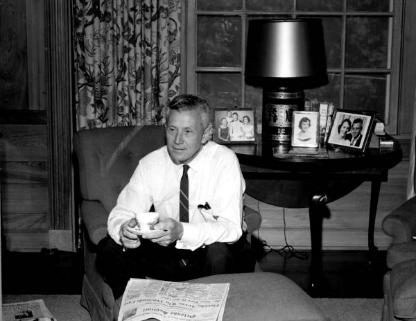 Governor LeRoy Collins relaxing on a chair - Tallahassee, Florida.