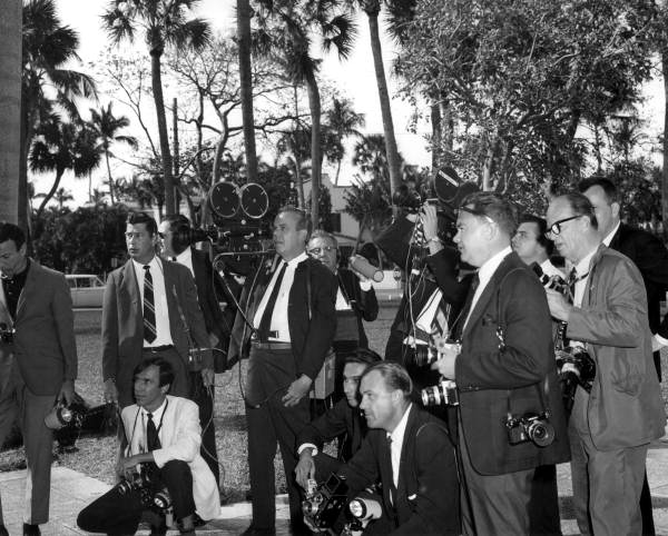 Newsman covering the events of Governor Kirk's wedding day - Palm Beach, Florida