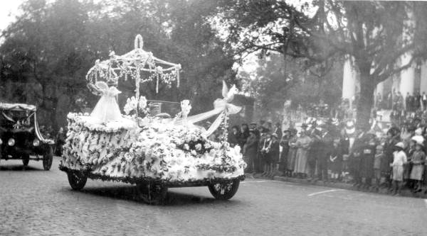 Paper flower covered car in the centennial celebration parade - Tallahassee, Florida.