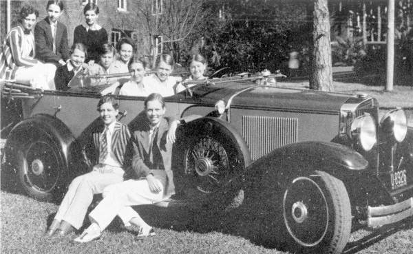 Cotillion Club members gathered on car for a group portrait - Tallahassee, Florida.