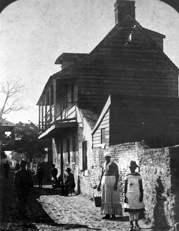African Americans on Charlotte street in front of house - Saint Augustine, Florida