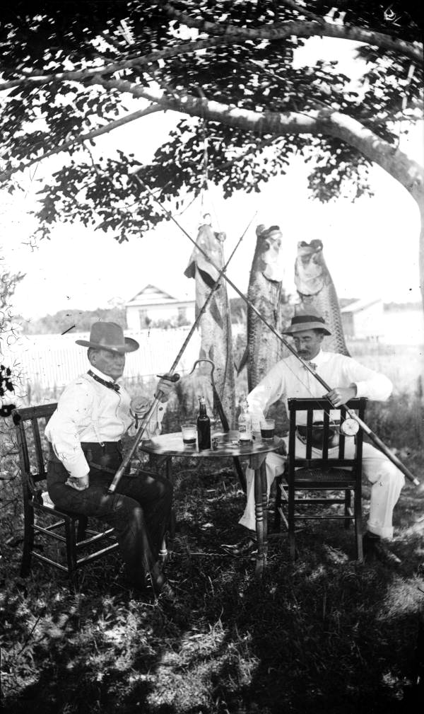 Drs. Leffinwell and Warren celebrate their catch of tarpon - Sarasota, Florida.