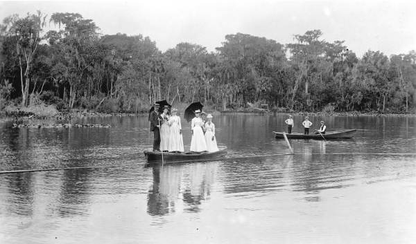 People standing in boat