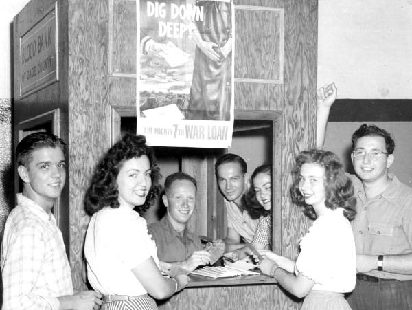 UM Students gathered around a blood bank booth on campus - Coral Gables, Florida