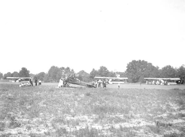 4 biplanes on the College Arms Hotel golf course - De Land, Florida