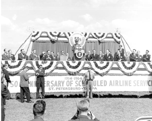 President John F. Kennedy speaking at an airline service anniversary - Tampa, Florida.