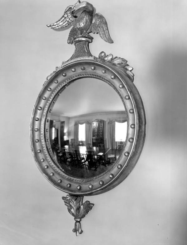 State dining room reflected in oval mirror on east wall in the Florida Governor's Mansion - Tallahassee, Florida