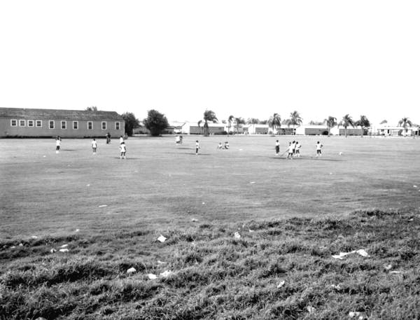 African American girls playing sports in a field