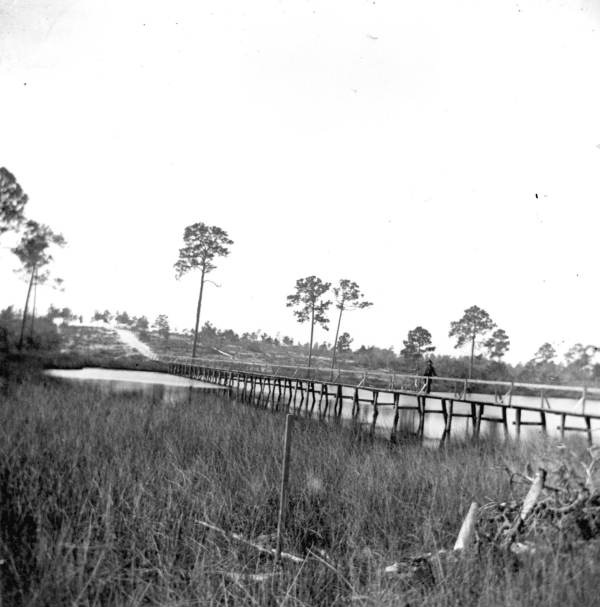 Man on Watson Bayou bridge - Bay County, Florida