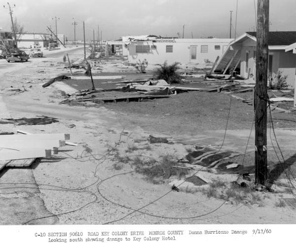 Looking south along Key Colony Drive at damage to Key Colony Hotel
