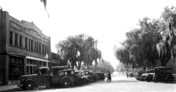 Cars parked on Main Street - Tavares, Florida.