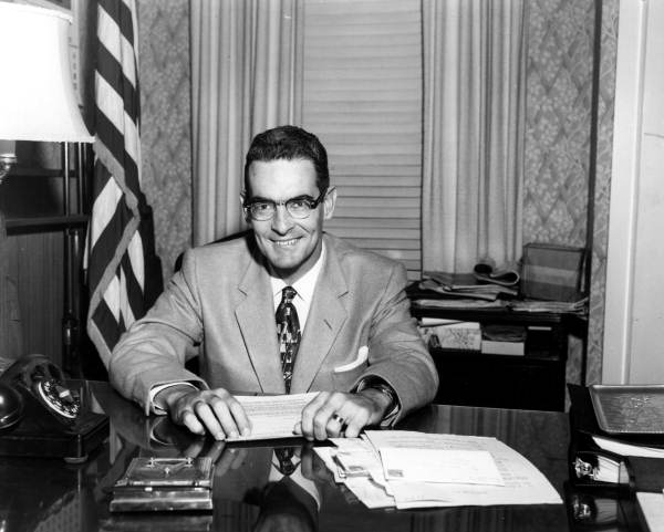 Governor Dan McCarty at desk in his office - Tallahassee, Florida.