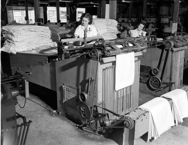 Interior view showing employees working at the Bemis Bro Bag Company - Jacksonville, Florida.