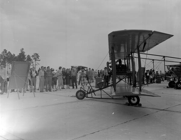 View showing a biplane in the Eastern Air Lines air show - Jacksonville, Florida.
