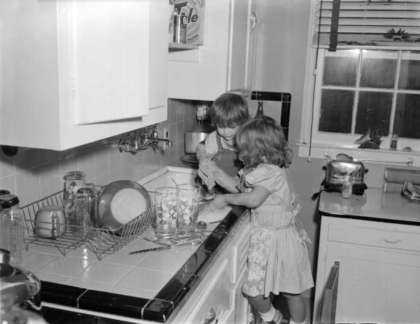 Unidentified children washing dishes at George Brunette's School of Art - Jacksonville, Florida.
