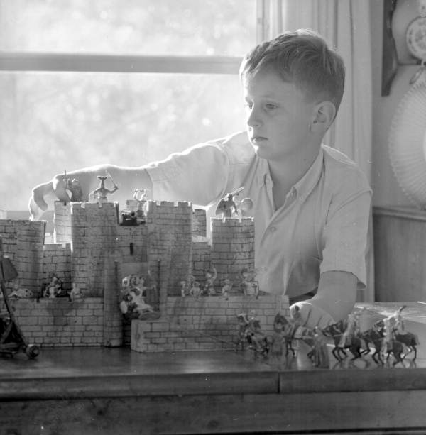 Dr. Webster Cash's son with castle and toy soldiers - Tallahassee, Florida.