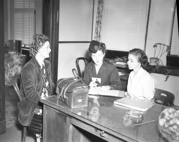 Public health nurse with patients.