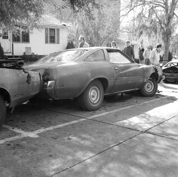 View showing a car damaged by arson at FSU in Tallahassee, Florida.