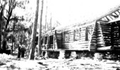 River side view of mess hall during construction by CCC workers at the Oleno forestry training camp (Oleno State Park) - Columbia Ciunty, Florida.