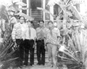 Seminole young men outside the mission