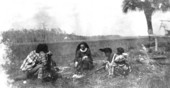 Deaconess Bedell and Seminole Indians roasting wieners