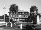 The Gibson Inn, with the Marks Memorial in the right foreground - Apalachicola, Florida
