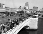 Large crowd awaiting the Gasparilla festival parade - Tampa, Florida.