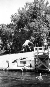 Girl dives into the springs - Sanlando Springs, Florida.
