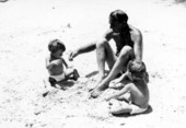 Grandfather and twins play on the beach at the springs - Sanlando Springs, Florida