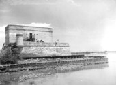 A couple visits Fort Matanzas at the waterfront of Matanzas River