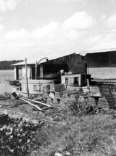 Stacked crates outside Douglas Fisheries - Welaka, Florida.