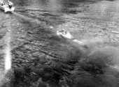 Boat towing Mary Darlington with diving fin.