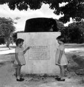 June and Joan Alburg standing next to the Maine marine memorial - Key West, Florida.