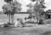 Three generations relaxing outdoors - Winter Haven, Florida