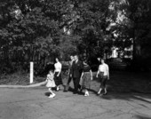 Governor LeRoy Collins and family walking from The Grove to the Governor's Mansion - Tallahassee, Florida.